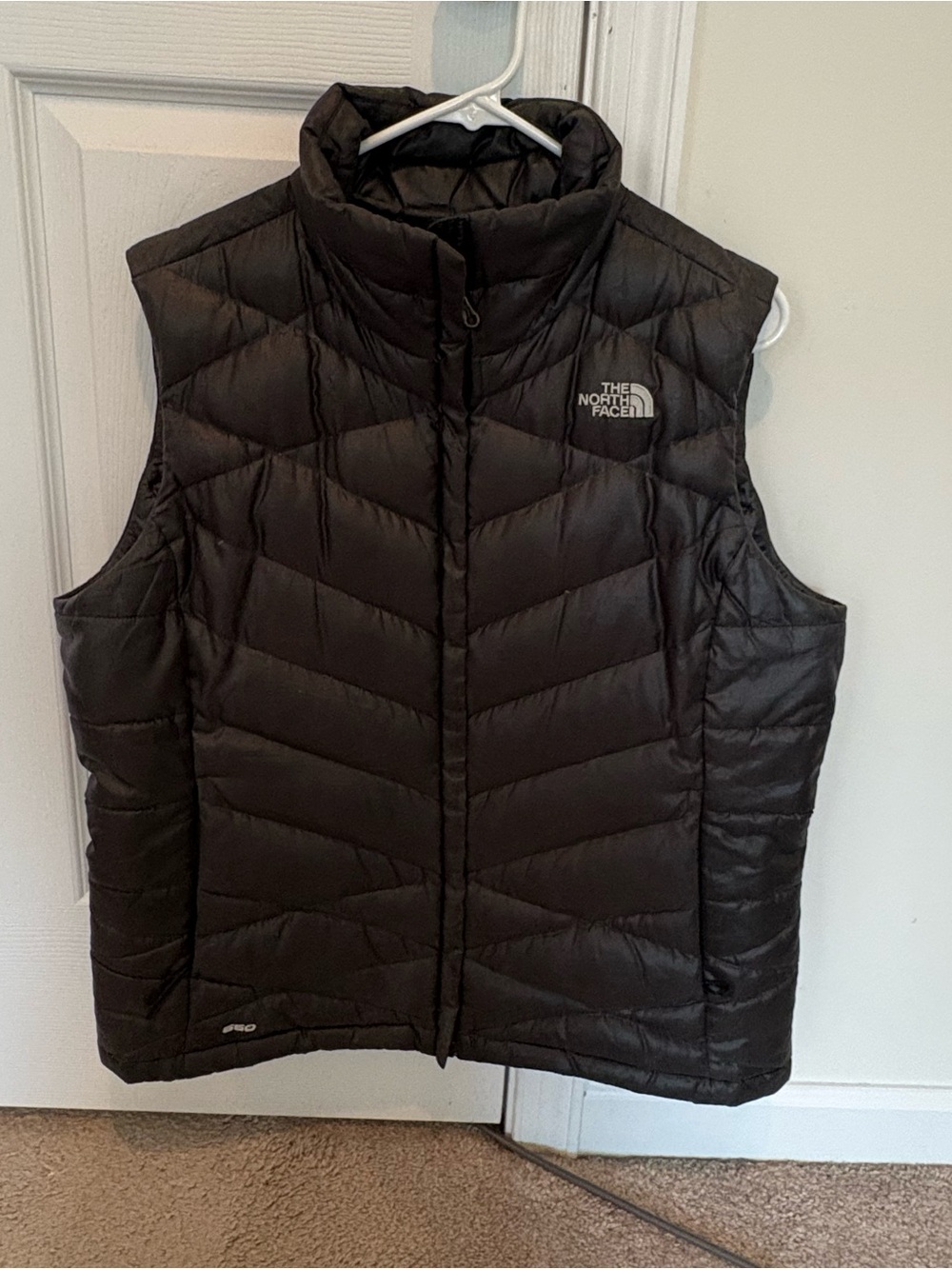 The North Face Black Quilted Puffer Vest with White Logo
